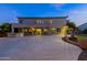 Two story home with outdoor kitchen and large backyard at night at 1912 E Gemini Pl, Chandler, AZ 85249