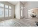 Elegant entryway featuring a view into the dining room and a grand staircase at 1912 E Gemini Pl, Chandler, AZ 85249