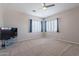 Spacious bedroom with ceiling fan, wood-look floors and plenty of natural light at 1912 E Gemini Pl, Chandler, AZ 85249