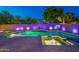 Relaxing pool and spa area with ambient lighting and a Buddha statue at 1912 E Gemini Pl, Chandler, AZ 85249