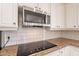 Kitchen with stainless steel microwave and granite countertops at 1912 E Gemini Pl, Chandler, AZ 85249