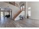 Bright entryway showcasing a staircase, high ceilings, and tile floors at 1912 E Gemini Pl, Chandler, AZ 85249