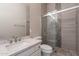 Bathroom features a walk-in shower with pebble floor and modern vanity at 1912 E Gemini Pl, Chandler, AZ 85249