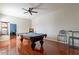 Game room with pool table, hardwood floors, and plenty of space at 1912 E Gemini Pl, Chandler, AZ 85249