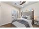 Spacious bedroom with a comfortable bed and plenty of natural light at 34599 N 99Th Way, Scottsdale, AZ 85262