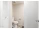 Clean bathroom with white toilet and tiled floor at 6742 N 43Rd Ave, Glendale, AZ 85301