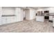 Modern kitchen with white cabinets and granite counters at 6742 N 43Rd Ave, Glendale, AZ 85301