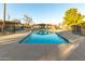 Community swimming pool with surrounding patio at 6742 N 43Rd Ave, Glendale, AZ 85301