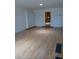 Living room with hardwood floors and an open concept to the kitchen at 3114 E Hazelwood St, Phoenix, AZ 85016