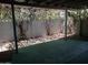 Covered patio with lush vine-covered walls at 3114 E Hazelwood St, Phoenix, AZ 85016