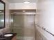 Bathroom with shower/tub combo and stone accents at 3114 E Hazelwood St, Phoenix, AZ 85016