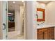 Bathroom with vanity, walk in shower, and closet at 8599 E Tecolote Cir, Scottsdale, AZ 85266