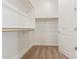 Large walk-in closet with double hanging rods and shelving at 7010 E Drygulch Rd, San Tan Valley, AZ 85143