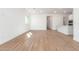 Bright and airy living room with wood-look tile floors at 7010 E Drygulch Rd, San Tan Valley, AZ 85143