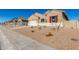 New home exterior view with desert landscaping at 7010 E Drygulch Rd, San Tan Valley, AZ 85143