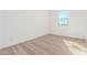 Bright bedroom with carpeted floor and large window at 7010 E Drygulch Rd, San Tan Valley, AZ 85143