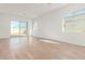 Spacious living area with sliding glass doors to backyard at 7010 E Drygulch Rd, San Tan Valley, AZ 85143