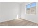 Well-lit bedroom featuring carpeted floors and a window at 7010 E Drygulch Rd, San Tan Valley, AZ 85143