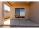 Covered patio with sliding glass doors at 7010 E Drygulch Rd, San Tan Valley, AZ 85143