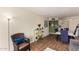 Bright dining area with table and chairs, hardwood floors, and access to patio at 3017 W Hearn Rd, Phoenix, AZ 85053