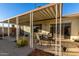Patio with covered seating area and table at 3017 W Hearn Rd, Phoenix, AZ 85053