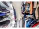 Large walk-in closet with ample shelving and hanging space at 3017 W Hearn Rd, Phoenix, AZ 85053