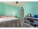 Bedroom with double bed, shelf, and window at 3017 W Hearn Rd, Phoenix, AZ 85053