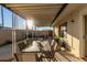 Patio with covered seating area and table at 3017 W Hearn Rd, Phoenix, AZ 85053