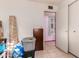 Bedroom with rolled carpet and storage bins at 3017 W Hearn Rd, Phoenix, AZ 85053