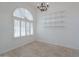 Bright office with hardwood floors, built-in shelves, and a chandelier at 1223 E Clearview Dr, Casa Grande, AZ 85122