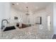 Spacious kitchen featuring granite countertops, ample cabinetry, and an island at 1223 E Clearview Dr, Casa Grande, AZ 85122