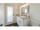 Updated bathroom with white cabinets and granite countertop at 1223 E Clearview Dr, Casa Grande, AZ 85122