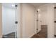 Bright hallway with doors to bedrooms and bath at 1223 E Clearview Dr, Casa Grande, AZ 85122