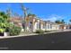 Tan house with tile roof, columns, and landscaping at 1223 E Clearview Dr, Casa Grande, AZ 85122