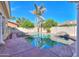 Inviting swimming pool with waterfall feature at 1223 E Clearview Dr, Casa Grande, AZ 85122