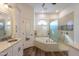 Elegant bathroom with soaking tub, walk-in shower and decorative tile at 1223 E Clearview Dr, Casa Grande, AZ 85122