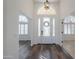Spacious entryway with hardwood floors and a view into the living areas at 1223 E Clearview Dr, Casa Grande, AZ 85122