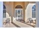 Elegant front door with a glass insert and a wreath at 1223 E Clearview Dr, Casa Grande, AZ 85122