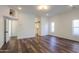 Light and airy bedroom with hardwood floors and barn door at 1223 E Clearview Dr, Casa Grande, AZ 85122