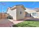 Side view of house with patio and trash cans at 1223 E Clearview Dr, Casa Grande, AZ 85122