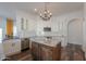 Modern kitchen with white cabinets, granite countertops and large island at 1223 E Clearview Dr, Casa Grande, AZ 85122