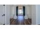 Bright foyer with hardwood floors, tall columns, and a chandelier at 1223 E Clearview Dr, Casa Grande, AZ 85122