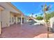 Spacious patio with flagstone design adjacent to the pool at 1223 E Clearview Dr, Casa Grande, AZ 85122