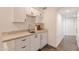 Modern white shaker cabinets and granite countertop wet bar at 1223 E Clearview Dr, Casa Grande, AZ 85122