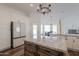 Modern kitchen with large island, granite countertops and stainless steel appliances at 1223 E Clearview Dr, Casa Grande, AZ 85122