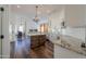 Spacious kitchen with island, stainless steel appliances, and white cabinets at 1223 E Clearview Dr, Casa Grande, AZ 85122