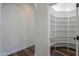 Walk-in pantry with custom shelving offering generous storage space at 1223 E Clearview Dr, Casa Grande, AZ 85122