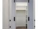 Bright walk-in closet with shelves and hanging space at 1223 E Clearview Dr, Casa Grande, AZ 85122