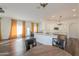Open concept kitchen with island and breakfast nook, overlooking living room at 1223 E Clearview Dr, Casa Grande, AZ 85122