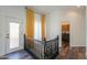 Upper hallway with laundry area and access to exterior at 1223 E Clearview Dr, Casa Grande, AZ 85122